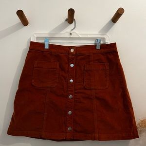UO Snap Front Corduroy Skirt in Rust